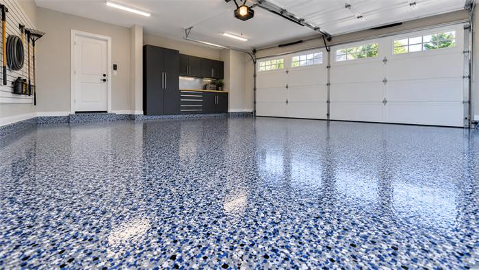 Coastal blue decorative flake polyaspartic three-car garage floor coating